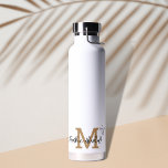 Gold Minimal Modern Initial Monogram Name Water Bottle<br><div class="desc">Are you looking for a cool personalized waterbottle? Check out this Beige Minimal Modern Initial Monogram Name Water Bottle . You can personalize it very easily with your own name and monogram. And as a bonus,  there are some added doodle stars. Happy customizing!</div>