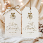 Gold Mistletoe Merry Christmas | Feliz Navidad Gift Tags<br><div class="desc">This holiday gift tag features elegant,  romantic swirly calligraphy with a winter mistletoe bouquet and a festive 'Merry Christmas' on the front,  along with 'Feliz Navidad' script on the back. For more advanced customization of this design,  please click the BLUE DESIGN TOOL BUTTON above!</div>
