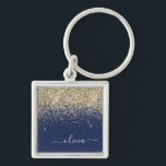 Gold Navy Blue Glitter Script Monogram Girly Name Keychain<br><div class="desc">Gold and Navy Blue Sparkle Glitter Script Monogram Name Keychains (Key Chain). This makes the perfect sweet 16 birthday,  wedding,  bridal shower,  anniversary,  baby shower or bachelorette party gift for someone that loves glam luxury and chic styles.</div>