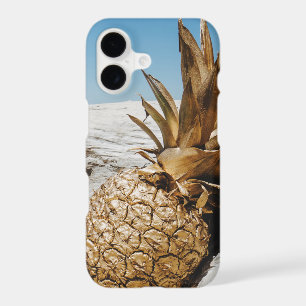 Gold pineapple on the beach