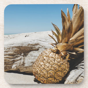 Gold pineapple on the beach coaster