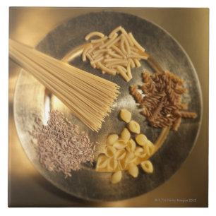 Gold Plate with pasta and grains of wheat Tile