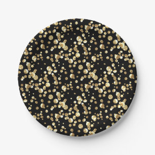 Gold polka dots on a black background . paper plate
