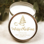 Gold Ribbon Tree Merry Christmas Script Classic Round Sticker<br><div class="desc">This modern holiday sticker features a gold ribbon Christmas tree above the words "Merry Christmas" in stylish gold-coloured calligraphy script. Personalize it with your family's name in serif font.</div>