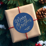 Gold Script Merry Christmas on Blue Classic Round Sticker<br><div class="desc">Merry Christmas in a faux gold foil script and your names in chic lettering,  these blue stickers are stylish for any Christmas holiday occasion. MORE COLORS and matching products in our collection.</div>