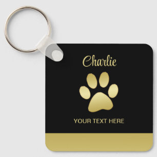  Gold Shiny Dog Paw on black background Keychain