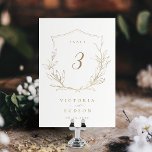 Gold simple botanical crest monogram wedding table number<br><div class="desc">Elegant rustic hand illustrated botanical leaves crest with modern trendy script and classic font in gold and white,   Simple and sophisticated. Great table cards for modern classic wedding,  simple formal wedding,  elegant botanical garden wedding. 
See all the matching pieces in collection</div>