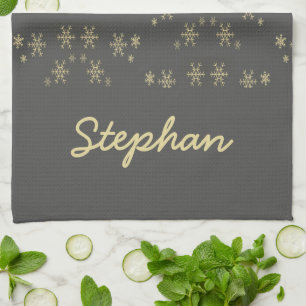 Gold snowflakes on grey kitchen towel