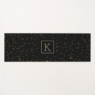 Gold sparkles and glitter and black yoga mat