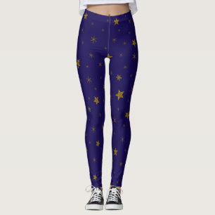 Gold sparkly Christmas stars on blue Leggings
