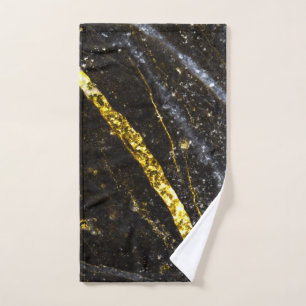 Gold sparkly line on black rock abstract hand towel