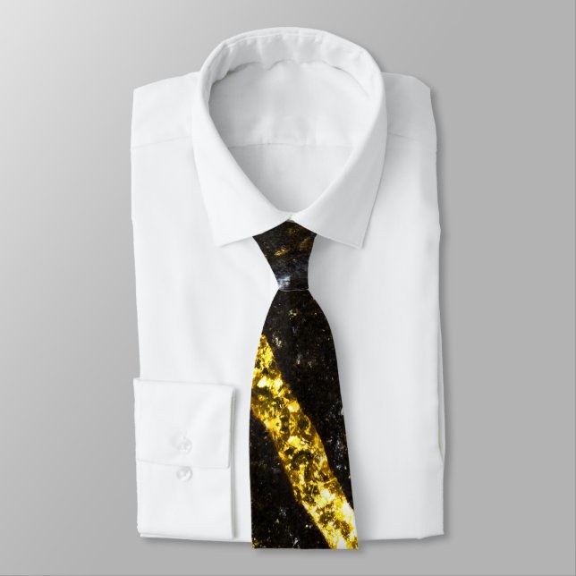 Gold sparkly line on black rock tie (Tied)