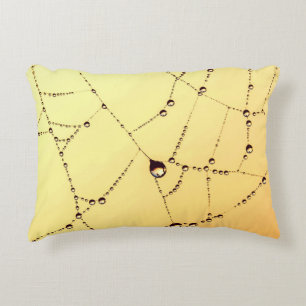 Gold spiderweb dew drop yellow gold web accent pillow