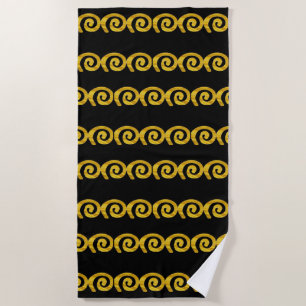 Gold spirals pattern on black beach towel