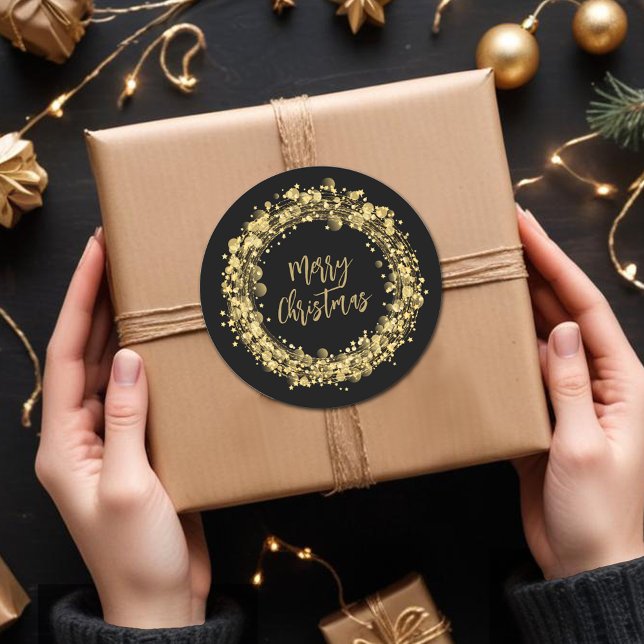 Gold Stars Merry Christmas Classic Round Sticker (Merry Christmas twinkling gold stars round stickers)