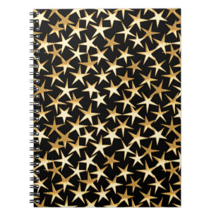 Gold stars on a black background notebook