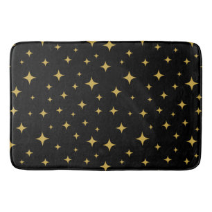 Gold twinkling stars black bath mat