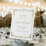 Gold Vintage Classic Script Wedding Guest Book Pedestal Sign<br><div class="desc">This elegant wedding guest book sign features classic script and ornate vintage frame in gold colour,  simple and timeless,  great for modern classic wedding,  romantic vintage bridal shower,  and formal traditional party. 
See all the matching pieces in collection.</div>