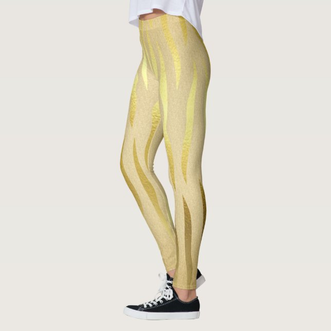 Gold zebra print dress leggings (Left)