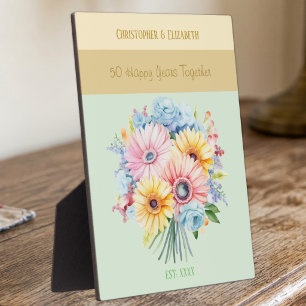 Golden 50th anniversary flowers names green plaque