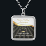 Golden 50th Wedding Religious Anniversary  Silver Plated Necklace<br><div class="desc">This congratulations gift item is the perfect way to commemorate a couple's 50th wedding anniversary with a religious touch. The design features two heart rings intertwined with a gold look on a black background, symbolizing the couple's enduring love and commitment to each other. together. It evokes a sense of divine...</div>