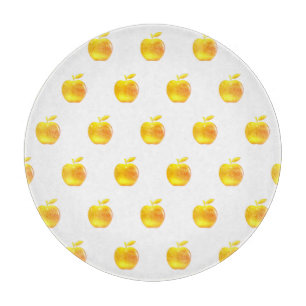 Golden Apples on White Cutting Board