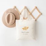Golden Bee Watercolor Wedding Favour Tote Bag<br><div class="desc">Our personalized tote bags make great wedding welcome bags or favours. Design features a honeybee illustration in golden yellow watercolors with the couple's names and wedding date in elegant charcoal grey script and block typography.</div>