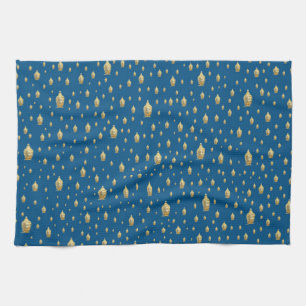 golden buddha in blue kitchen towel