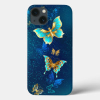 Golden Butterflies on a Blue Background