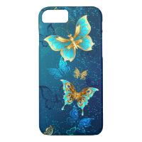Golden Butterflies on a Blue Background