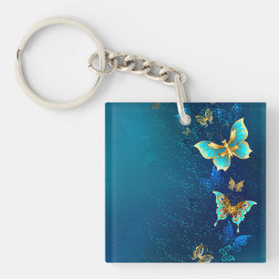 Golden Butterflies on a Blue Background Keychain