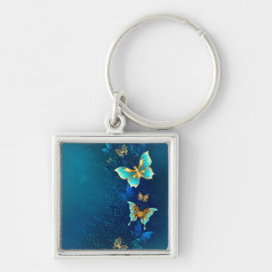 Golden Butterflies on a Blue Background Keychain