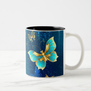 Golden Butterflies on a Blue Background Two-Tone Coffee Mug