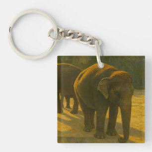 Golden Companions – Elephant Trio in Warm Light Keychain