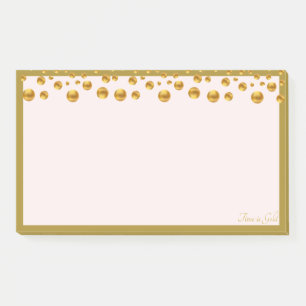 Golden confetti and golden frame on ivory post-it notes
