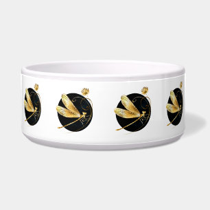 Golden dragonfly in black circle