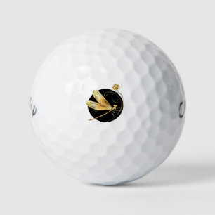 Golden dragonfly in black circle golf balls