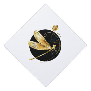Golden dragonfly in black circle graduation cap topper