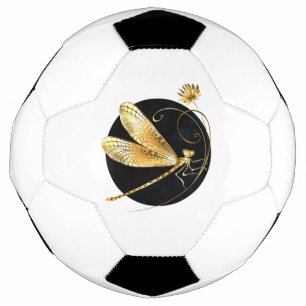 Golden dragonfly in black circle soccer ball