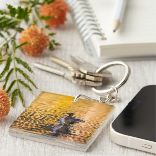 Golden eye on a golden lake keychain