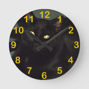 Golden eyes round clock