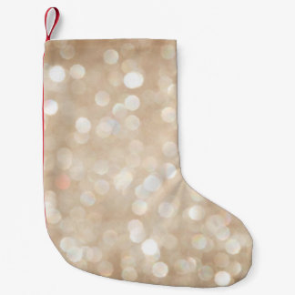 Golden glitter, blurred Christmas background. Small Christmas Stocking