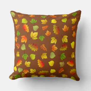 Golden, Green, Orange Autumn Leaves on Brown Throw Pillow