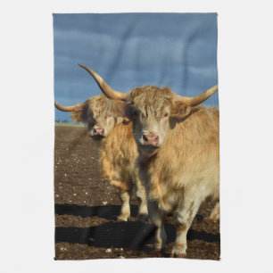 Golden Highlands: The Grace of Fawn-Coloured Cows Kitchen Towel