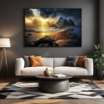 Golden Horizon Canvas Print<br><div class="desc">A stunning landscape where the sea meets majestic mountains under a dramatic sky. Golden sunlight breaks through clouds,  illuminating sand and rocks. Ideal for bringing calm and grandeur to any space. Digital art capturing nature's raw and serene beauty with perfection.</div>