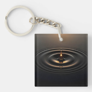 Golden Impact on Viscous Surface Keychain