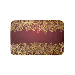 Golden leaf lace on red background bath mat