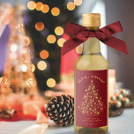 Golden Lights Christmas Tree on Red Mini Holiday Wine Label<br><div class="desc">These mini holiday wine labels feature a festive design with a Christmas tree made of golden lights or sparkles on a marbled crimson red background. The caption reads "Merry Christmas" with room for a short note or signature, and the type of wine or bottle contents. Perfect for home brewers, or...</div>