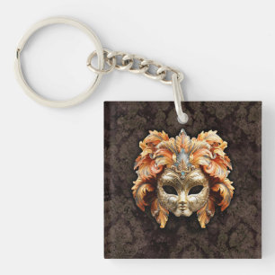 Golden Lion Mask with a Orange Feathers Keychain