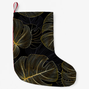 Golden monstera leaves, romantic seamless floral. small christmas stocking